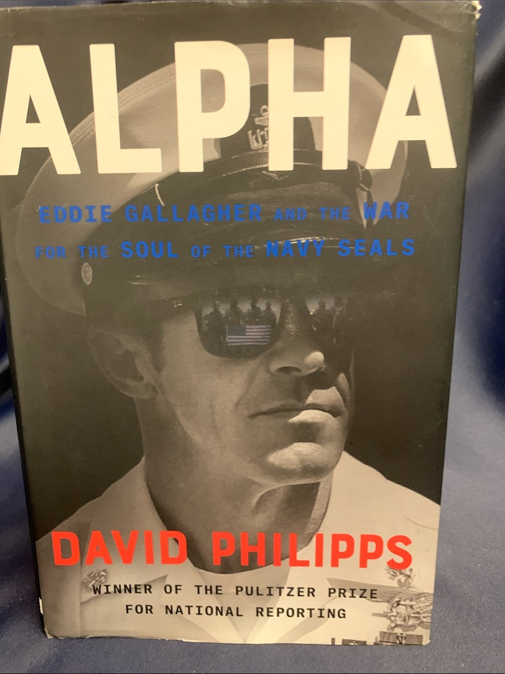 Alpha by David Philipps - Black & White Cover with Red Title